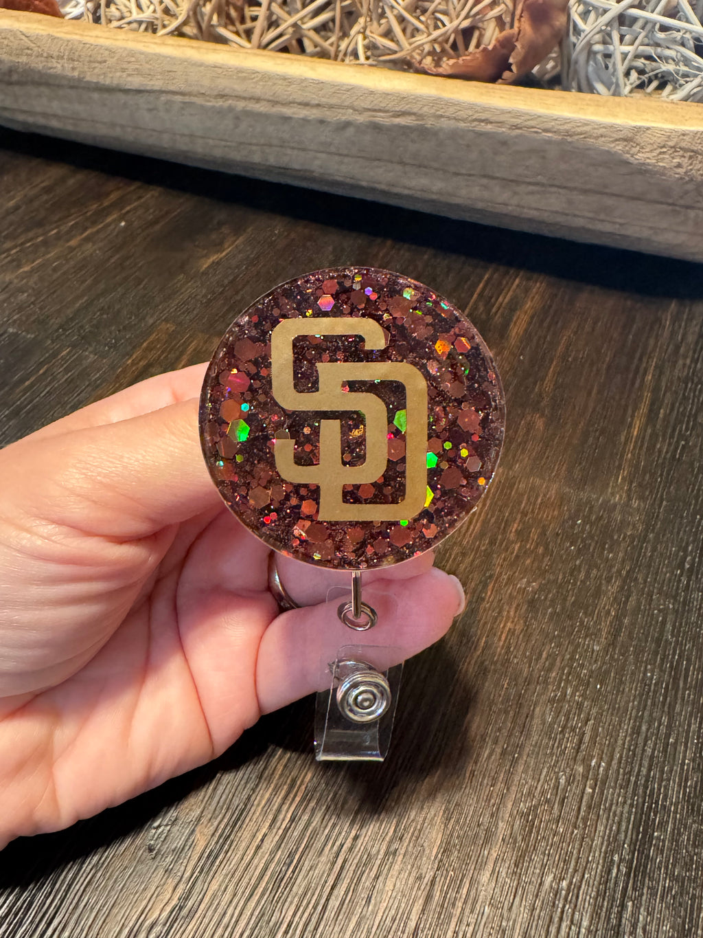 Retractable badge reel