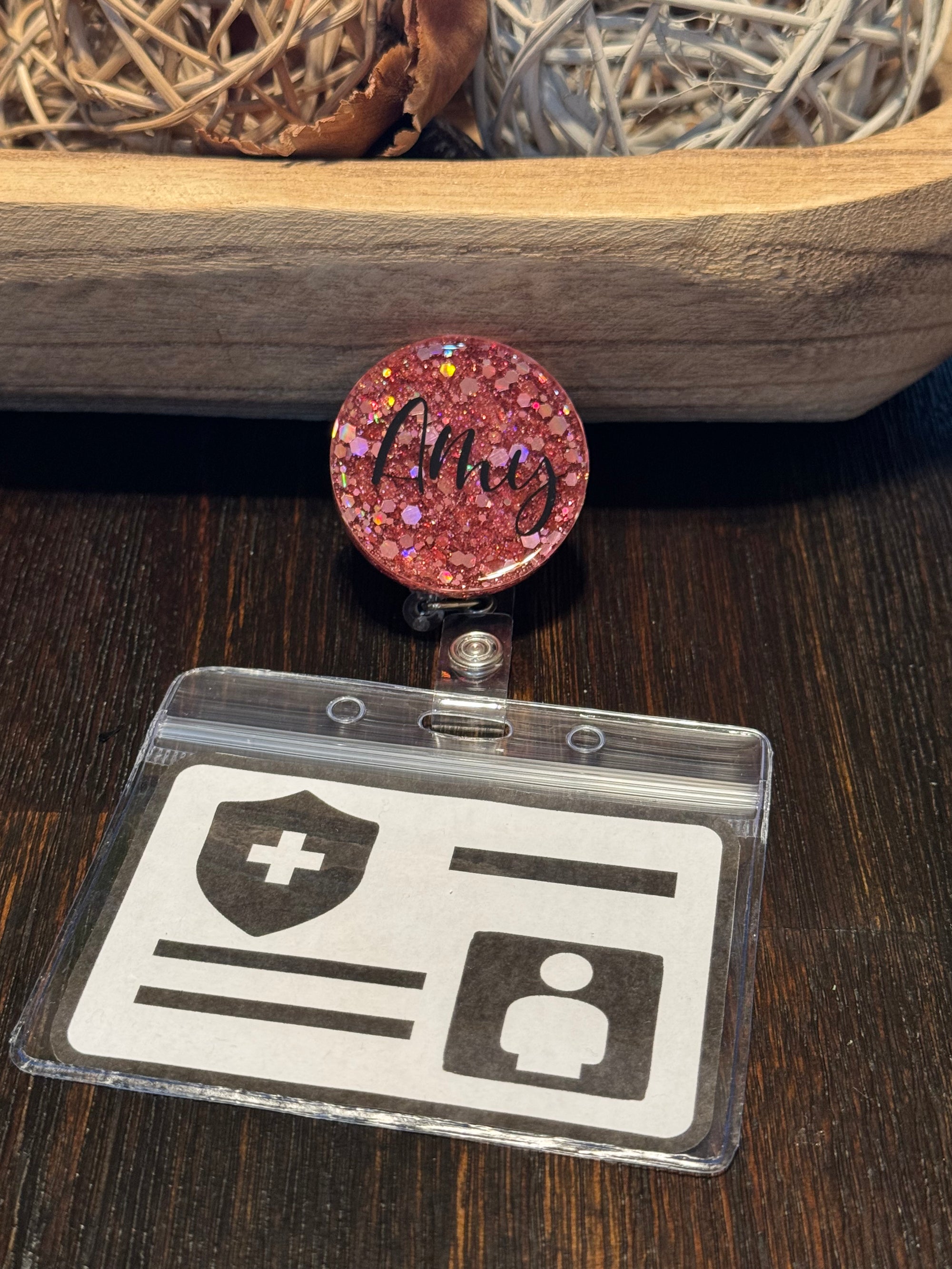 Retractable badge reel