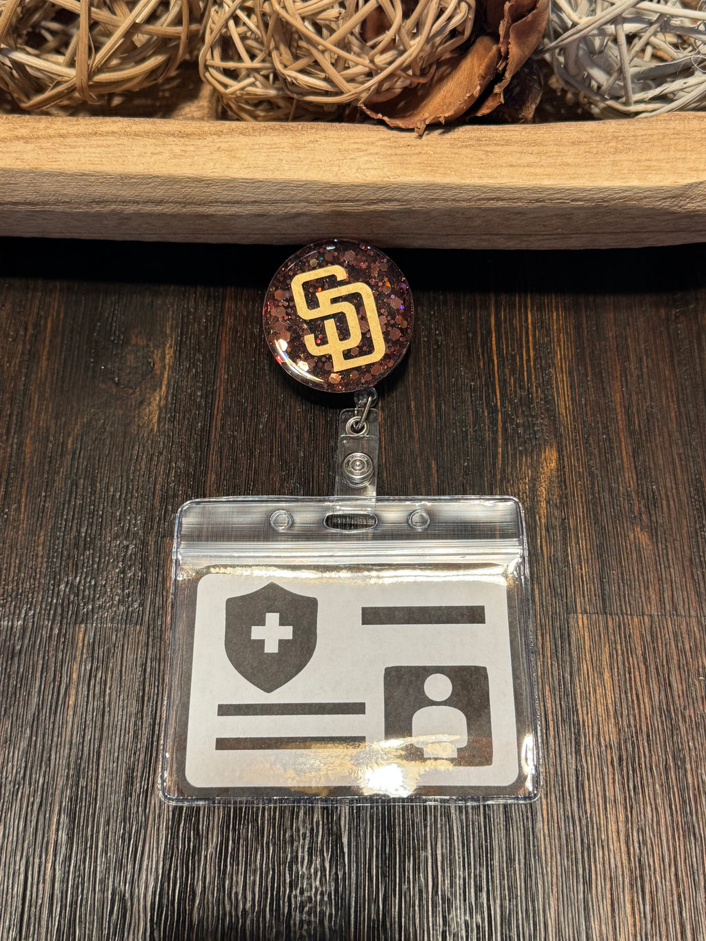 Retractable badge reel