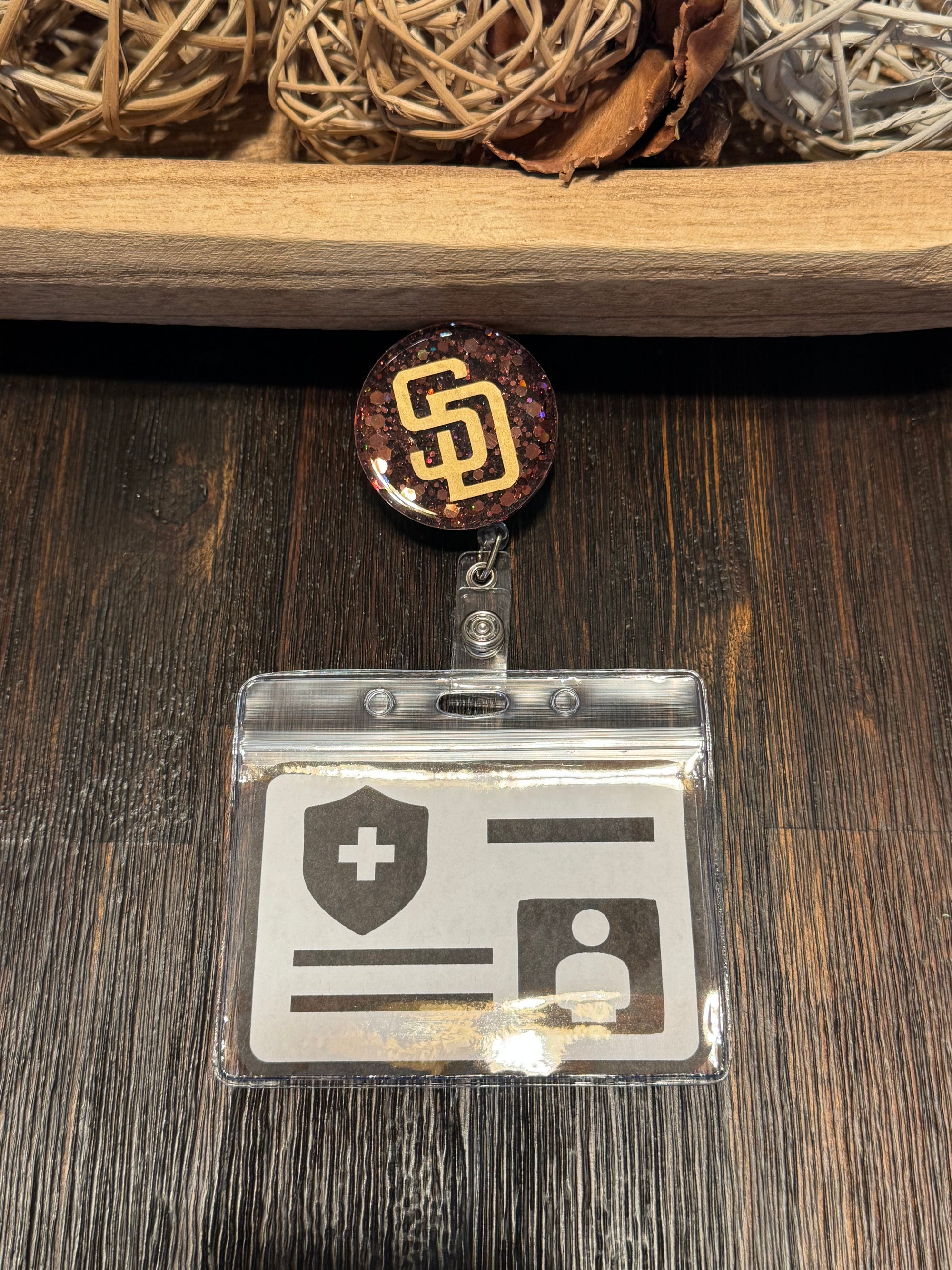 Retractable badge reel